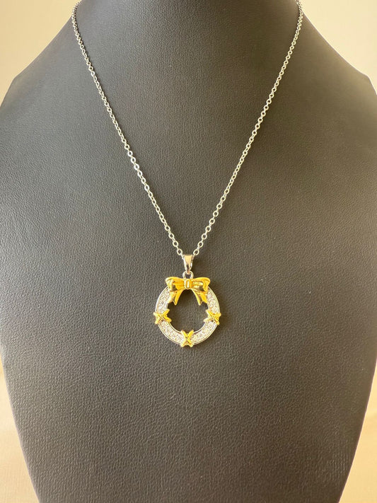 Stainless Steel- Gold necklace bow in zircon circle