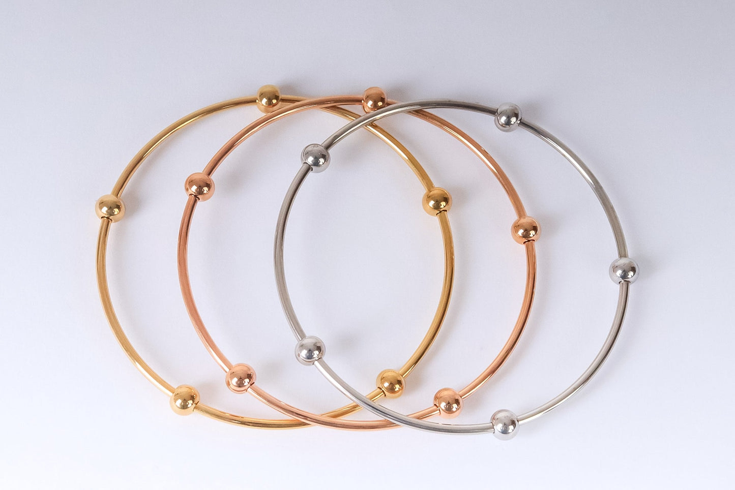 Stainless steel - 3 colored bangles with small balls