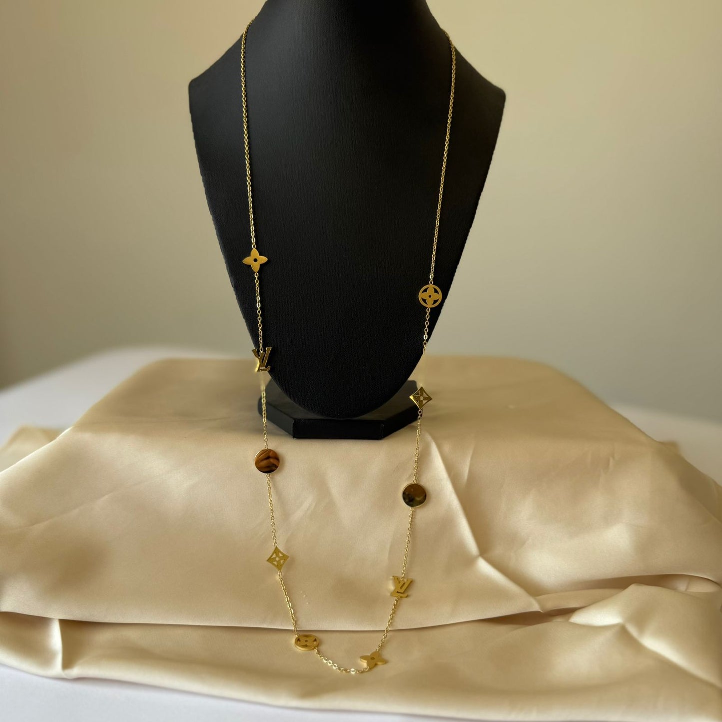 Stainless Steel- Gold necklace 10 gold different shapes