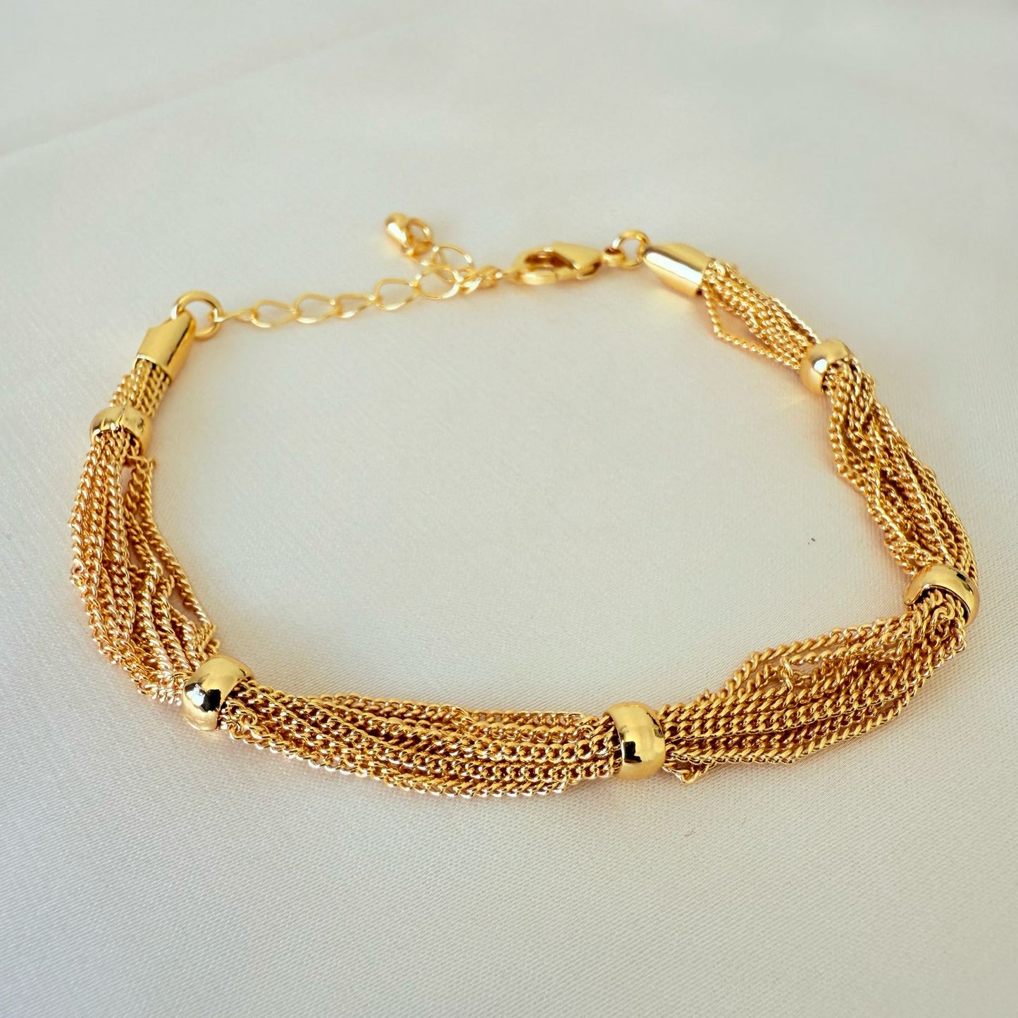 Bracelet - Simple gold chains with each other