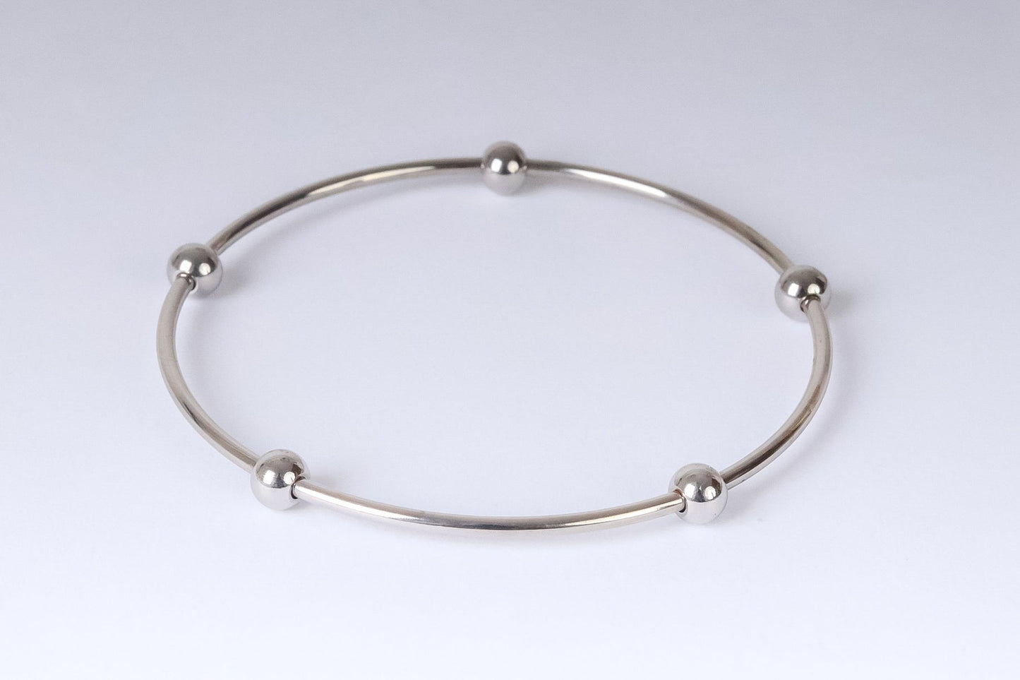 Stainless steel - 3 colored bangles with small balls