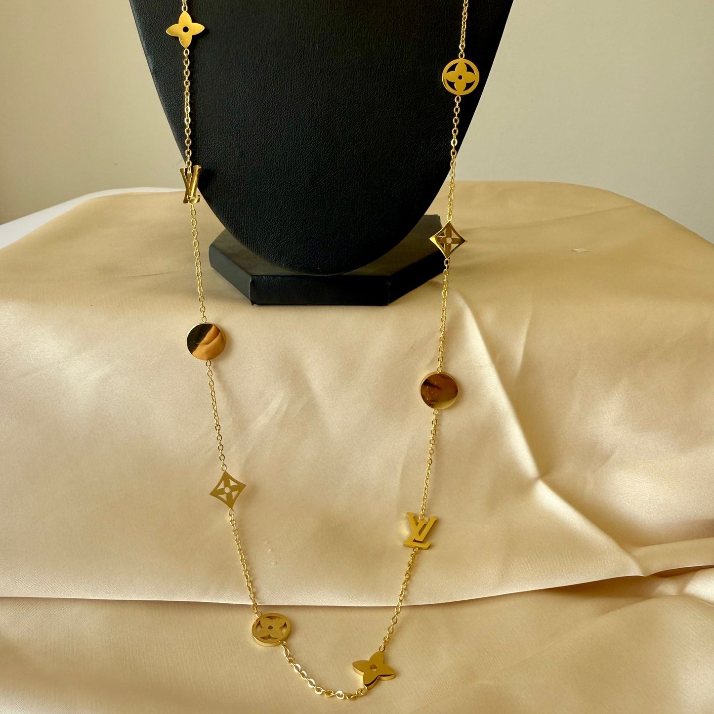Stainless Steel- Gold necklace 10 gold different shapes